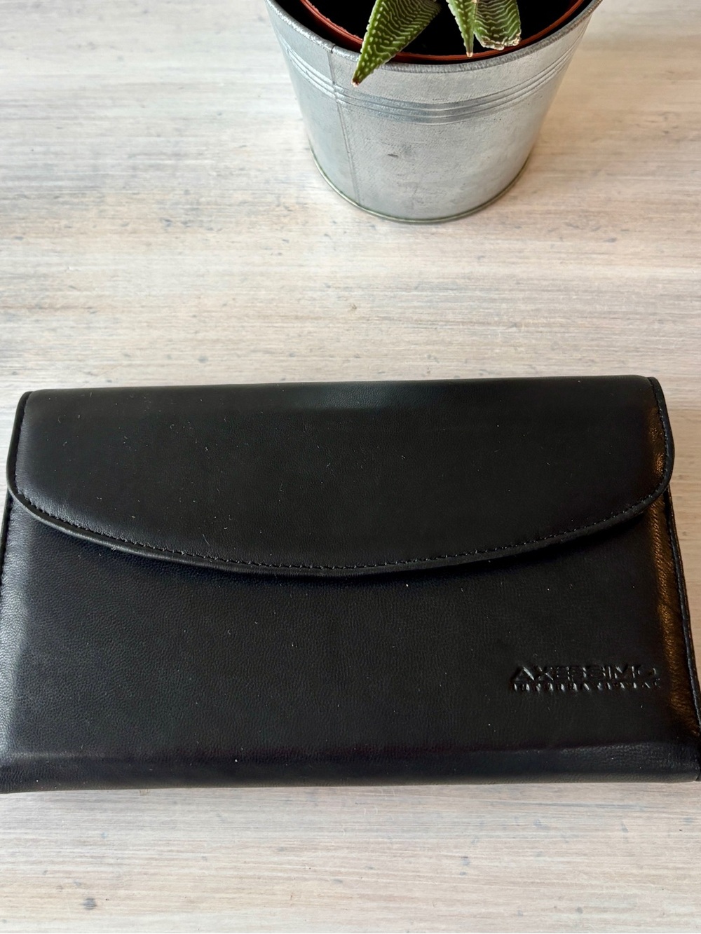 Men’s Black Axessimo Lambskin Leather Wallet with Zip Pocket.
